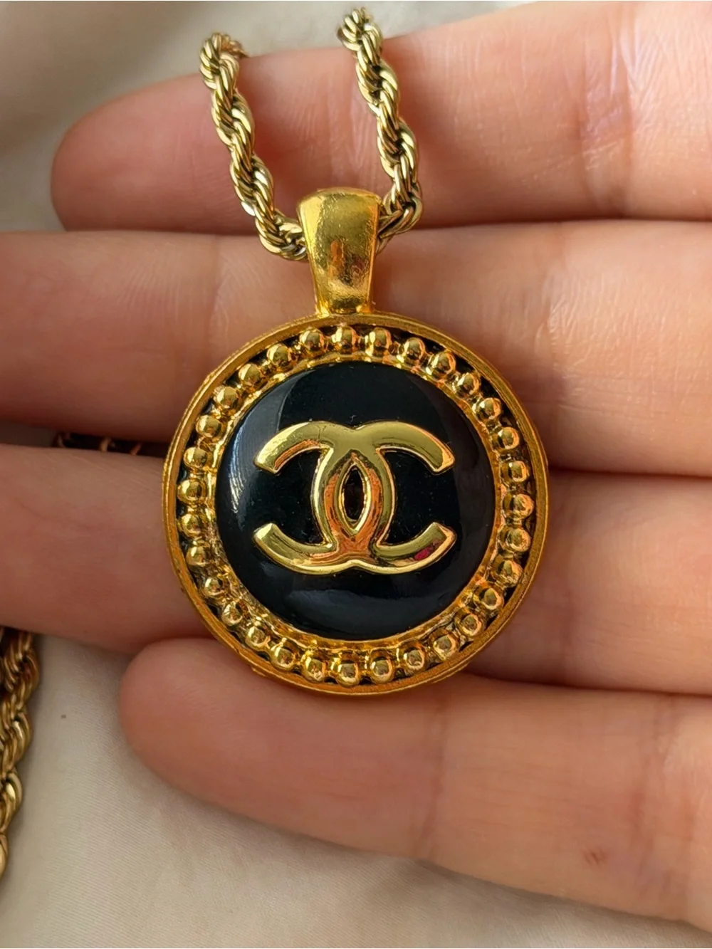 CHANEL Gold and Black Round CC Medallion Necklace